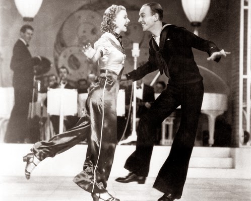 Ginger Rogers doing it backwards and in high heels with Fred Astaire in Follow The Fleet.