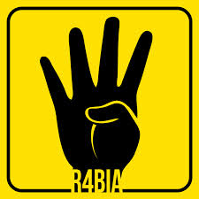 The Rabaa hand gesture commemorating the victims of the Rabaa Square massacre in Cairo last year.