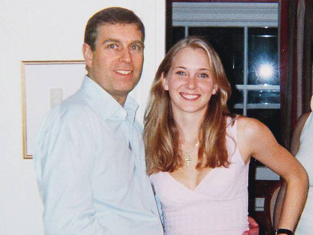 Prince Andrew with Virginia Roberts, who has accused him of havinf sex with her when she was under age.