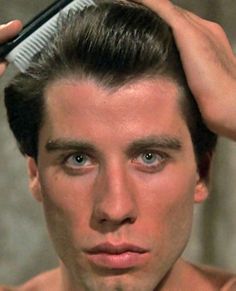 John Travolta. Aquarius Sun.